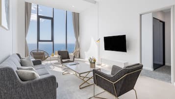 Two Bedroom Ocean Sky Suite | Living area | 58-cm Smart TV with digital channels, TV, streaming services