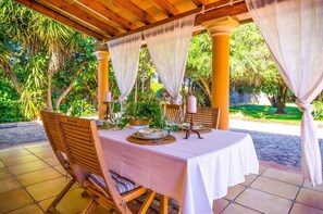 Outdoor dining - Holiday Home Finca "Es Mua" with Pool, Wi-Fi, Air Conditioning & Garden (Muro)