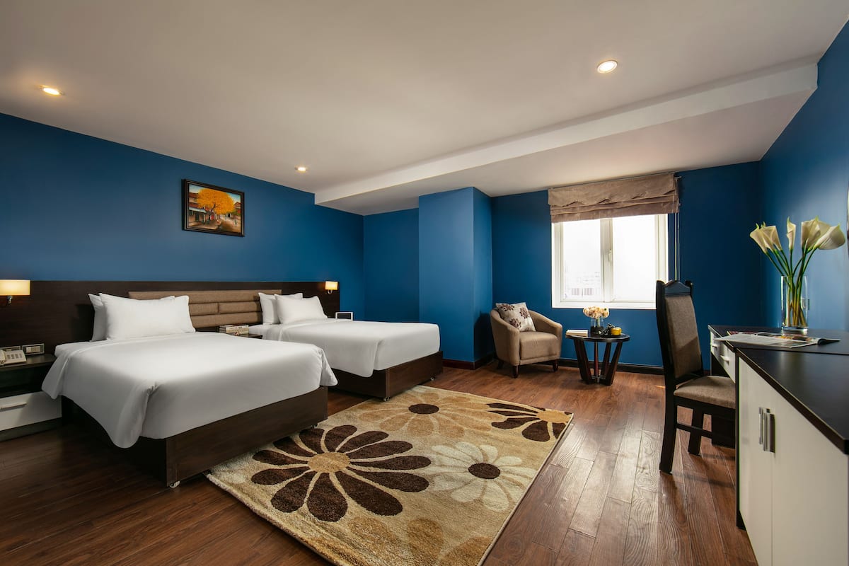 Family Room | 1 bedroom, premium bedding, free minibar items, in-room safe