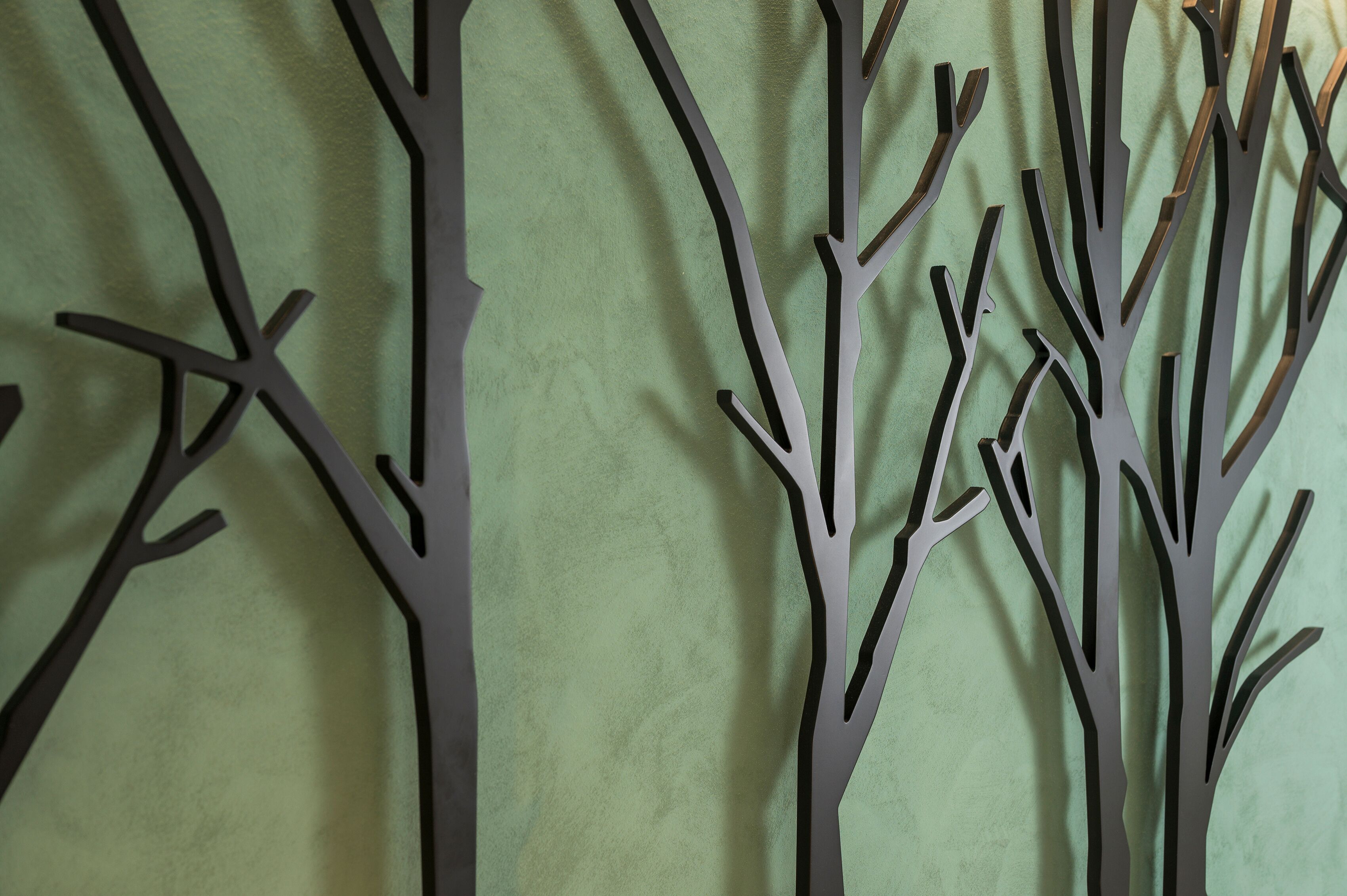 A wall with a geometric tree-like structure.