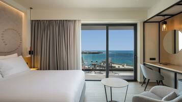 Hypo-allergenic bedding, free minibar items, in-room safe, desk