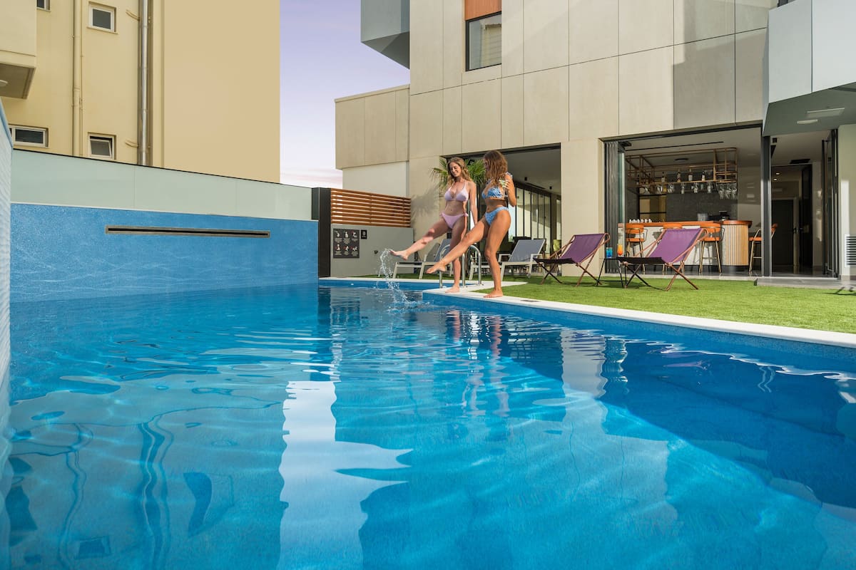 outdoor pool, pool loungers