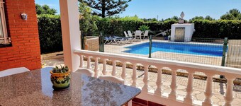 Cozy little house with private pool and security fence for children.