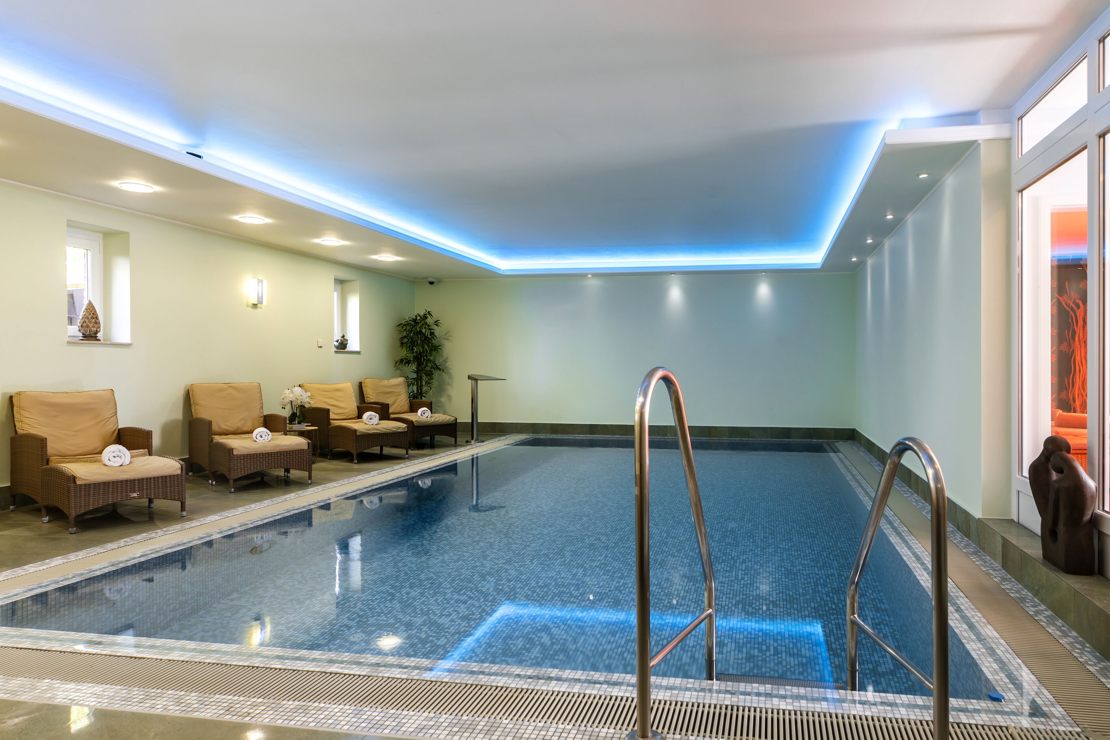 indoor pool, pool loungers