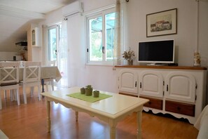 Apartment | Living room | 30-inch TV with digital channels - Sea View Apartment on Walking Distance to sea (Marina)