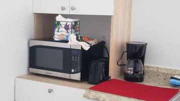 Fridge, microwave, coffee/tea maker, toaster