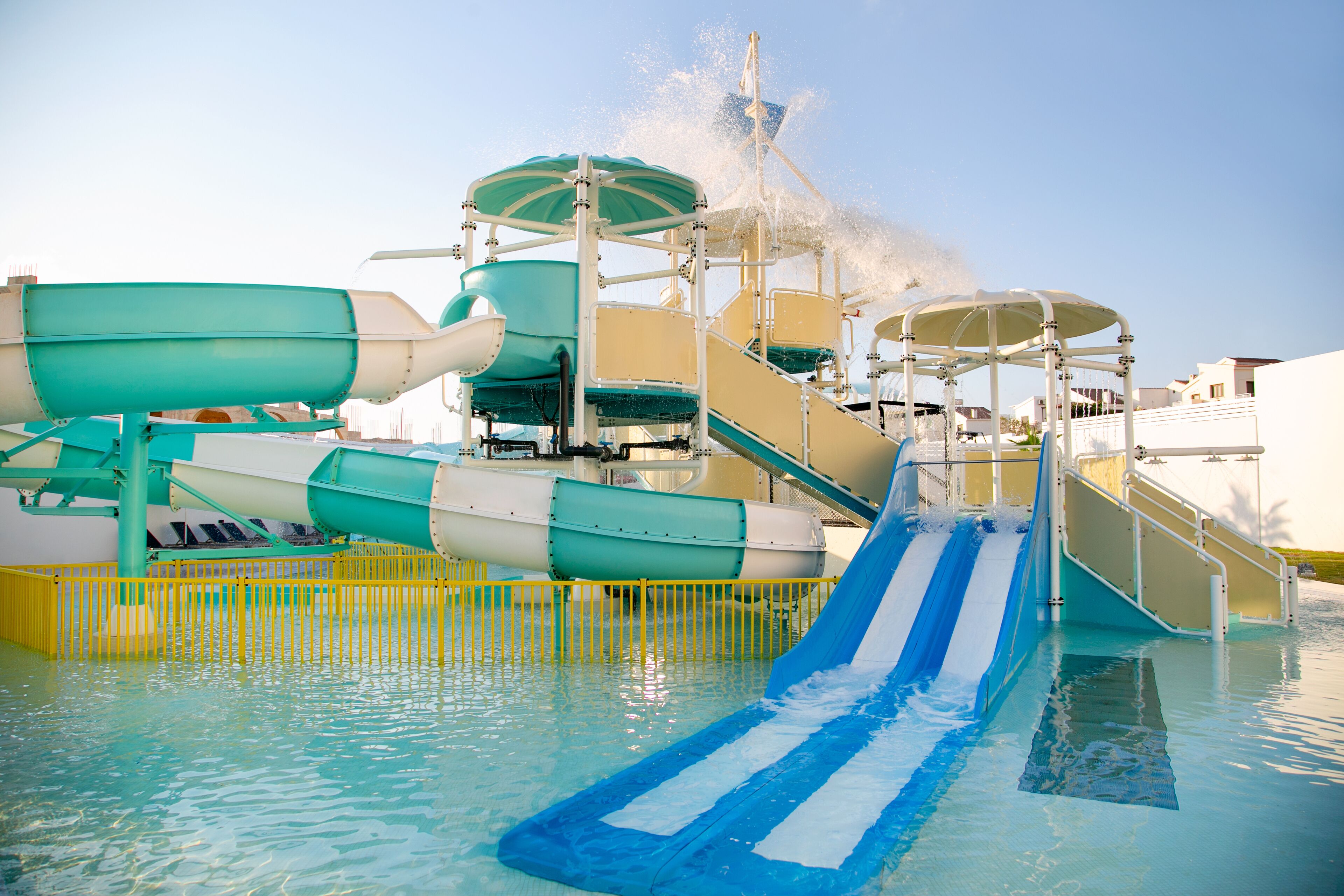 A water park with multiple slides and water features.