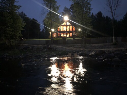 Adirondack  river house with a new pavilion seats 50 constructed fall of 2025