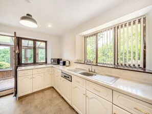 Oven, dishwasher, high chair, cookware/dishes/utensils