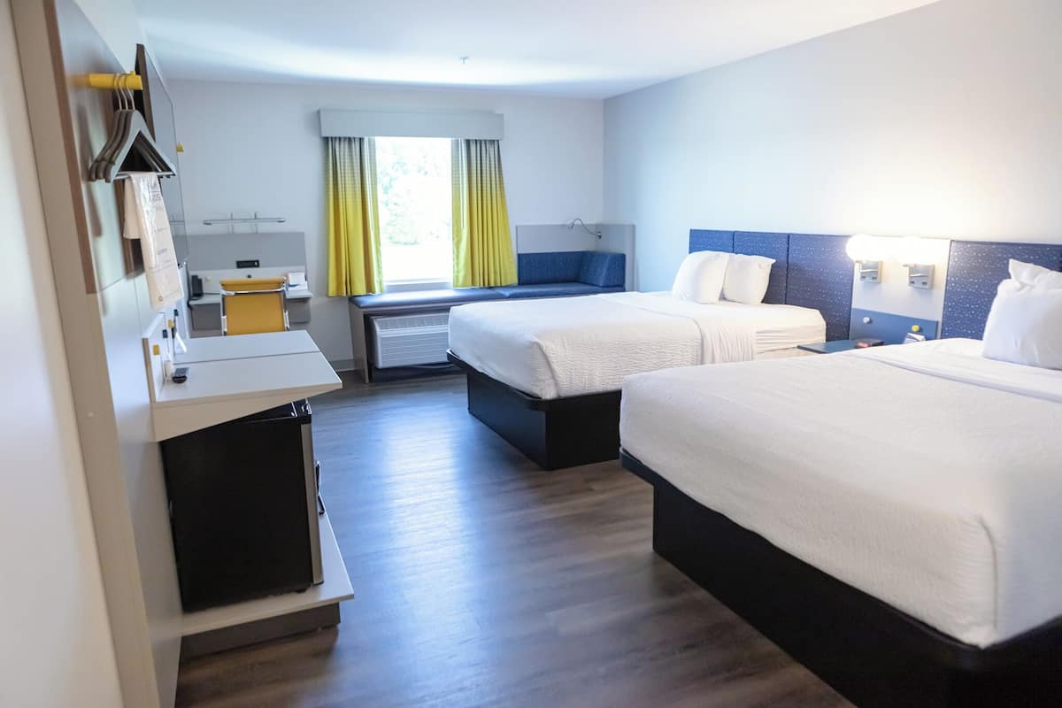 Desk, laptop workspace, free WiFi, bed sheets