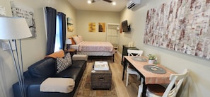1 bedroom, desk, iron/ironing board, travel crib