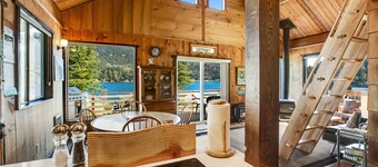 Adorable lake hideaway with free WiFi, spacious deck, lake views, & shared dock