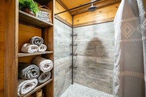 Bathtub, hair dryer, towels, soap