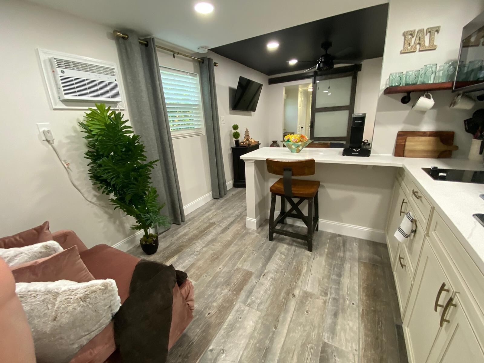 Fridge, microwave, stovetop, coffee/tea maker