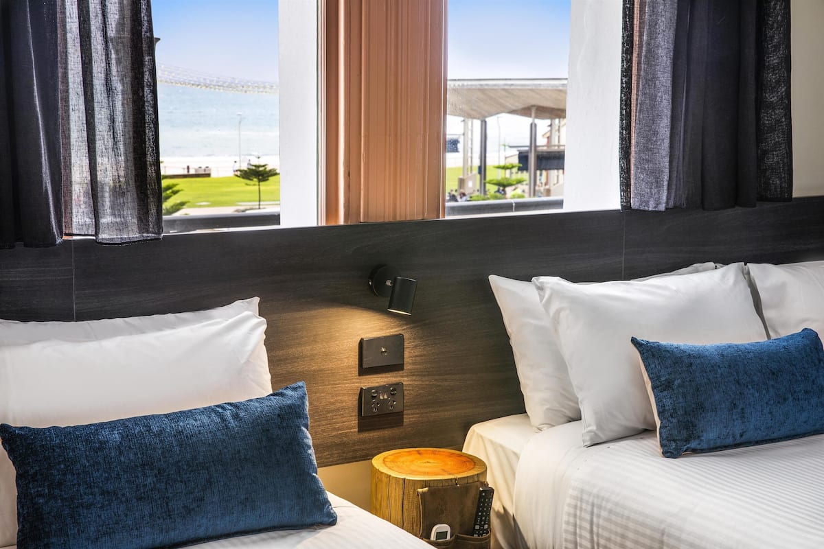 studio twin queen - shared bathroom facilities | 1 bedroom, desk, iron/ironing board, free wifi