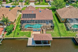 Exterior - Blue Haven Large Waterfront Pool Home | Boat Dock | Canal | Water Views | Pool Bar | WIFI | Fishing (Palm Coast)