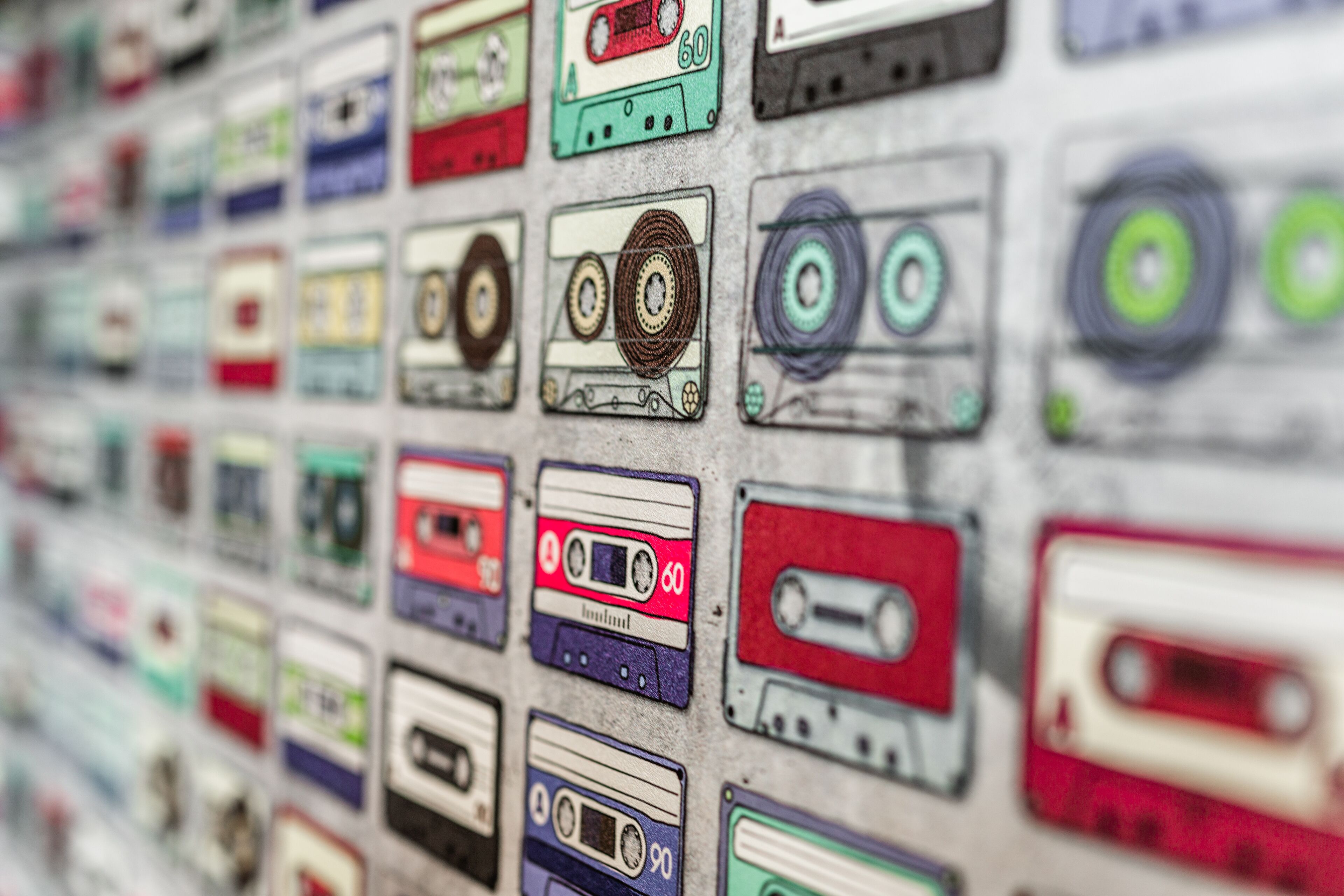 A wall of various cassette tapes.