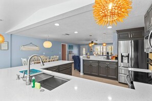 Fridge, microwave, oven, stovetop - Island Getaway: Tropical Oasis Backyard, Pool, Dog Friendly, 1.5 blocks to Beach by Anna Maria Life (Holmes Beach)