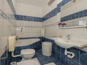 House | Bathroom | Bathtub, hair dryer, towels