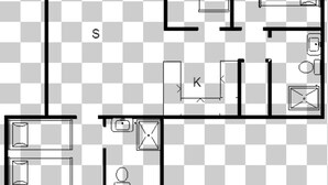 Distribución de una habitación de hotel con cama, escritorio, silla, armario y baño.