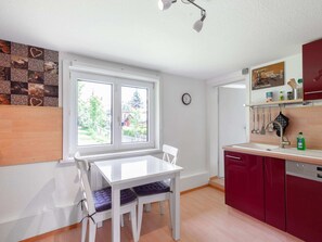 Appartement | Cuisine privée | Chaise haute