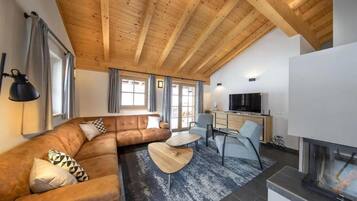 Ferienhaus | Wohnzimmer | Kamin