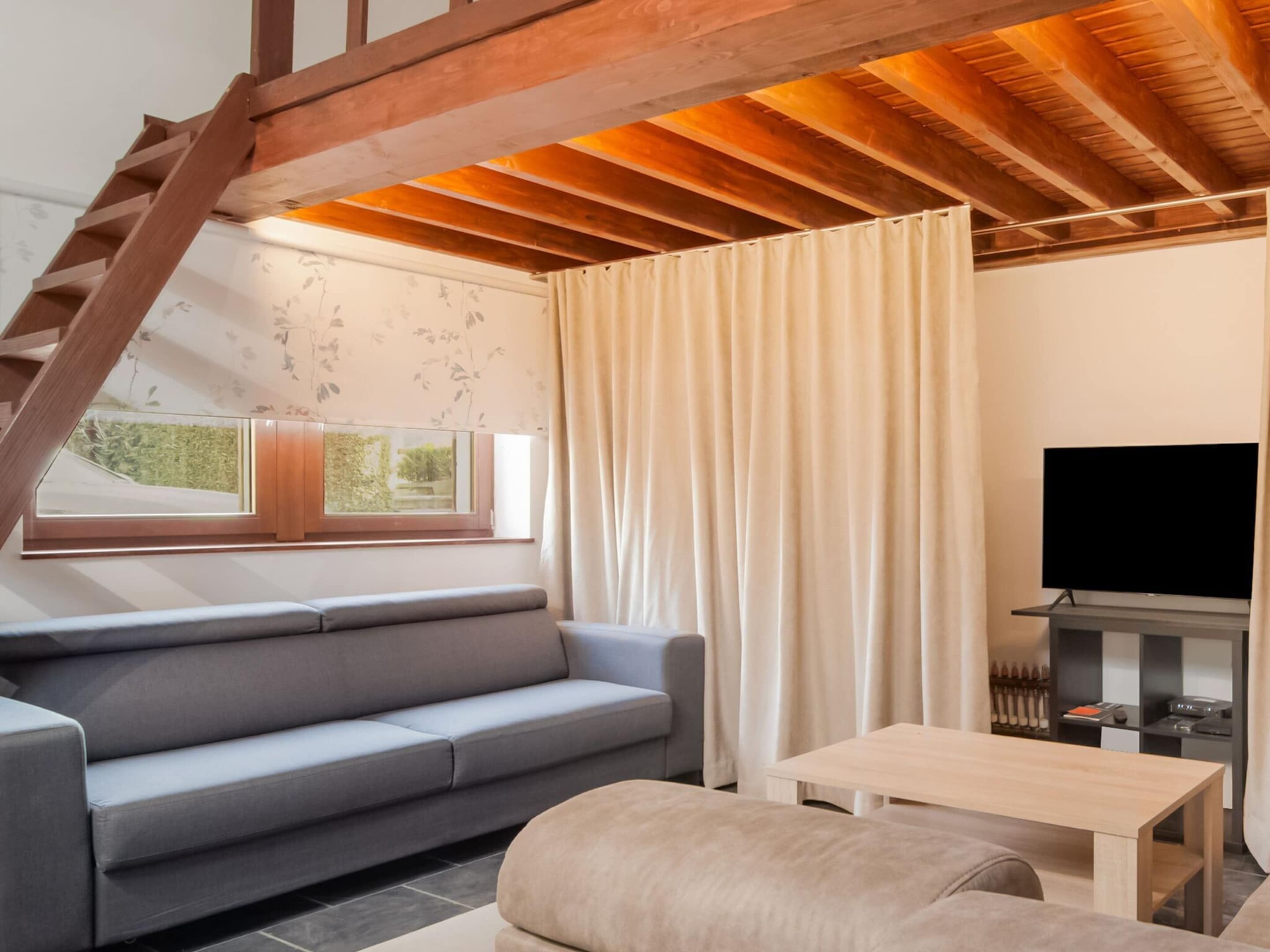 Ferienhaus | Wohnbereich | Fernseher