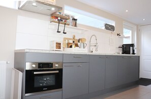 Cottage | Private kitchen | Dishwasher, high chair, cookware/dishes/utensils - Cottage in Paesens Near Wadden Sea (Paesens)