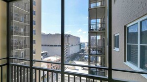 A high-rise building with multiple balconies and large windows. - Modern Twist in Historic Building, sleeps 6 (Atlanta)