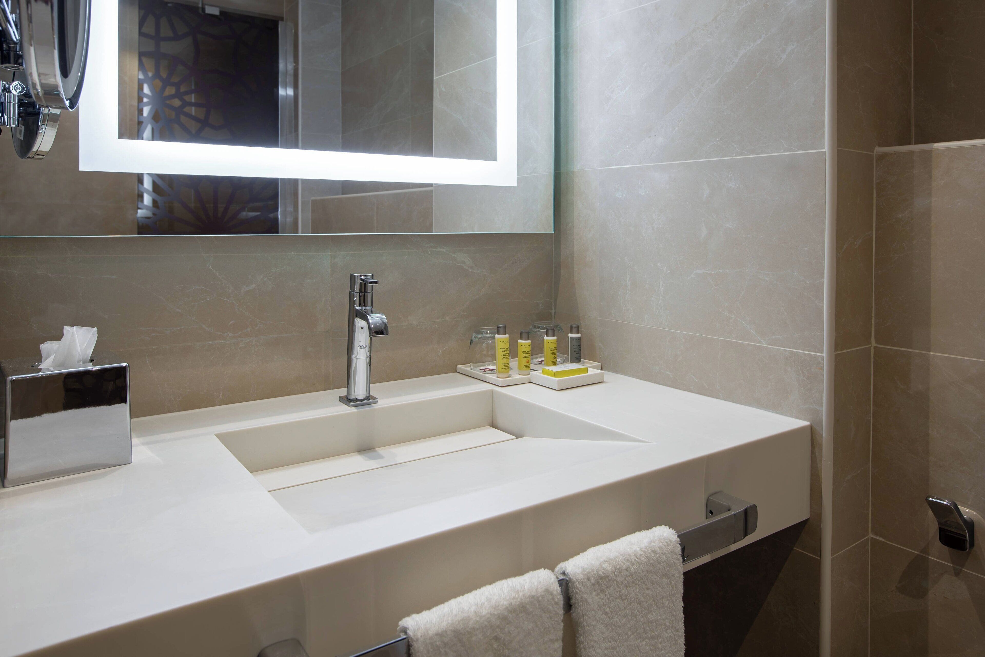 deluxe room, 1 king bed | bathroom | shower, free toiletries, hair dryer, bathrobes