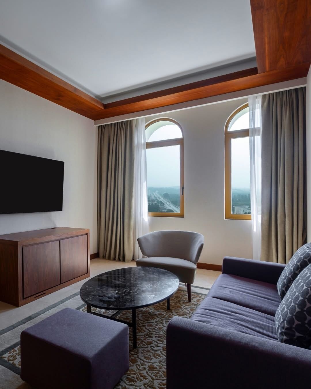 65-inch flat-screen TV with cable channels, fireplace, heated floors