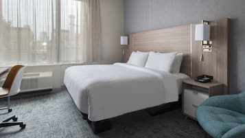 Down comforters, desk, laptop workspace, blackout drapes