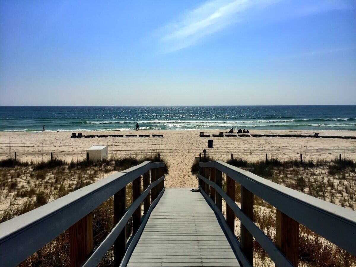On the beach, sun-loungers