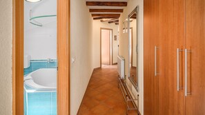 Bathtub, hair dryer, towels
