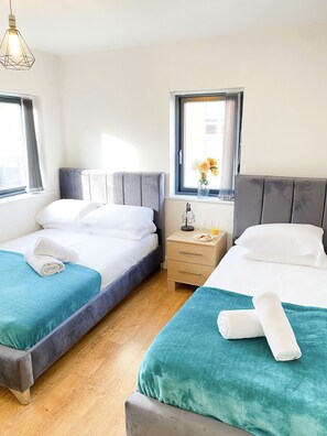 Departamento urbano | 2 habitaciones, cuna de viaje, wifi gratis y ropa de cama