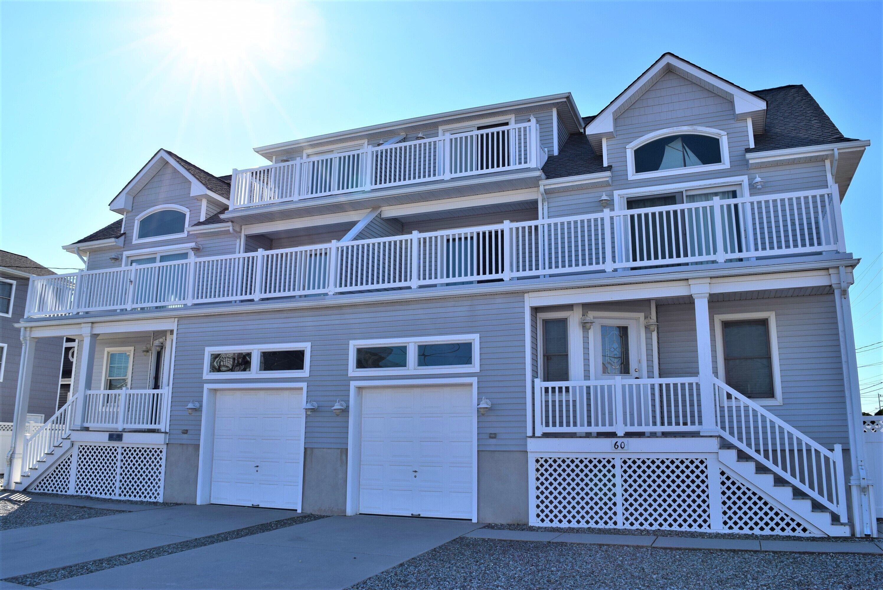 Seashore Sweet Corner Model with great views of the ocean and only steps away to the beach.