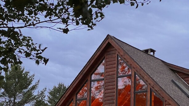 A log cabin with a balcony, large windows, and a fire pit area. - Wiggleswick Cottage; Dogs Welcome Certified! 9/17-9/19 available! (Georgetown)