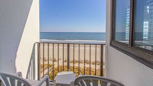 A balcony with a view of the beach and ocean. - Nicely Updated!  Oceanfront Studio - Palace 302 (Myrtle Beach)