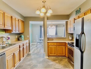 Condo, 3 Bedrooms, Balcony, Partial Ocean View (No Pets - C105) | Private kitchen | Full-sized fridge, microwave, oven, stovetop - Sea Oats by ALBVR (Gulf Shores)