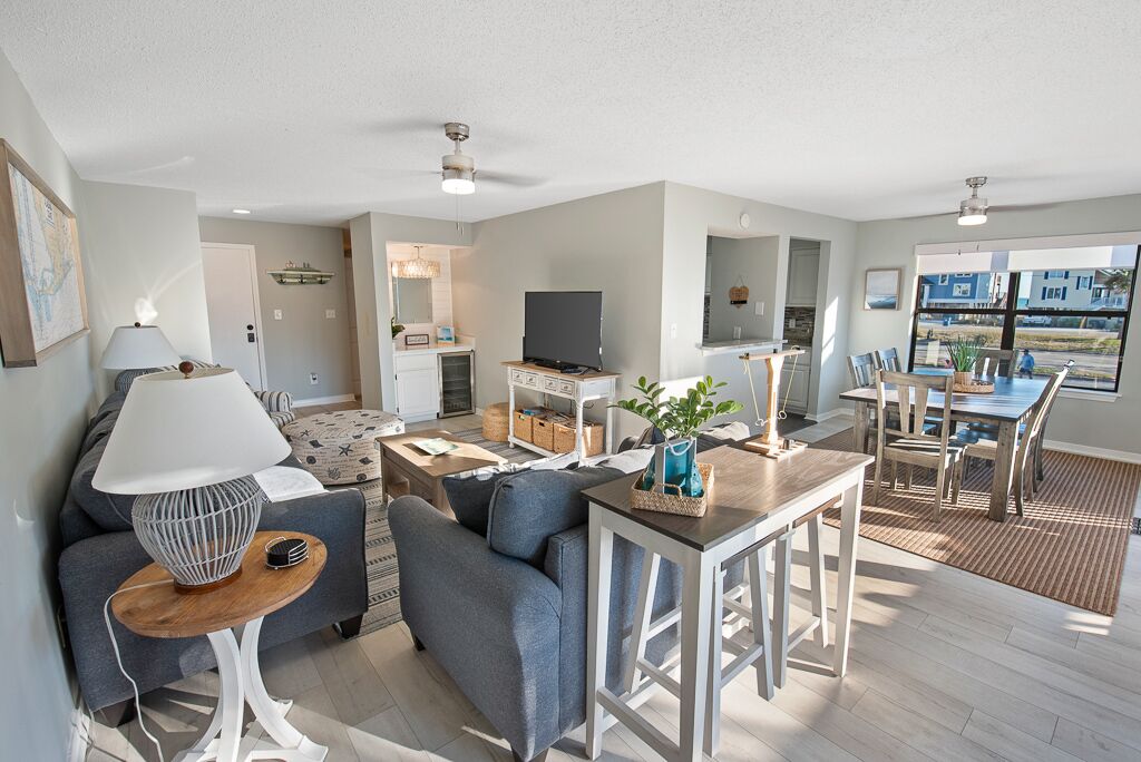 Condo, 3 Bedrooms, Balcony, Pool View (Pet Friendly – B105) | Living area | 50-inch flat-screen TV with cable channels, TV