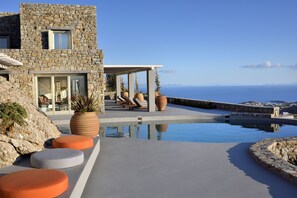 Outdoor pool, an infinity pool - Amazing View From Every Room Tear-drop-Shaped Infinity Pool with Jacuzzi (Mykonos)