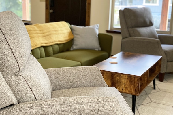 Living Room—Two recliners are perfect for lounging in front of the fireplace.