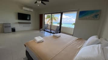 Habitación Deluxe, 1 cama King size | Cortinas blackout, wifi gratis y ropa de cama