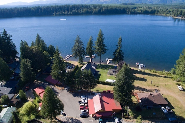 Red roofs on the left are cabins, large red roof is the Restaurant