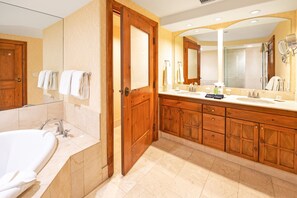 Bathtub, hair dryer, towels, soap