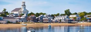 Situated on a sandy beach, this charming town features a historic church and a variety of homes with gabled roofs and porches.