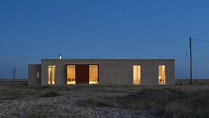 A modern, single-story building with large windows and an open door, set in a rural landscape. - Pump Station by Bloom Stays in Dungeness - stunning location (Dungeness)