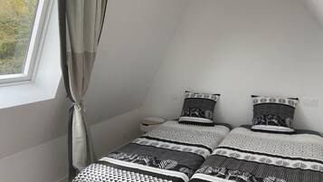 2 quartos, berço de viagem, Wi-Fi de cortesia, roupa de cama