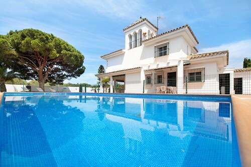 Villa Virgen del Camino by the Beach with Pool, Terrace, and Garden