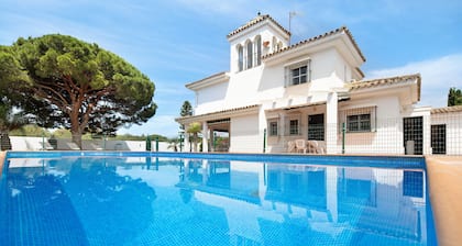 Villa Virgen del Camino by the Beach with Pool, Terrace, and Garden